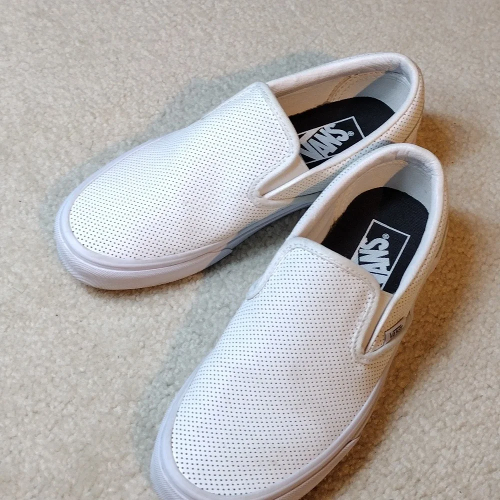 Vans men's white perforated leather slip on loafers. Size 5.5
